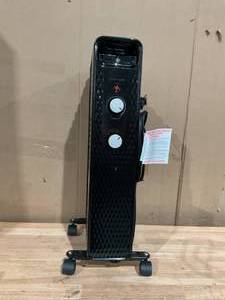 lot 404 image: Mainstays Mechanical Oil Filled Electric Radiator Space Heater