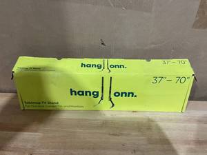 lot 421 image: Onn Table top TV Stand for 37 to 70 TVs, ETL Listed, Holds up to 110 lbs