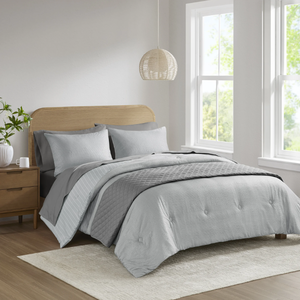lot 221 image: 8PCS Queen Size Mainstays Reversible Bed in a Bag Comforter Set with Sheets