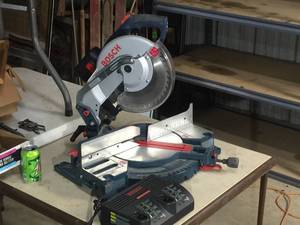 lot 115 image: Bosch 10 Cordless 24V Compound Miter Saw - Nice