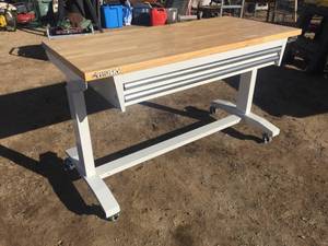 lot 111 image: Husky 52 x 24 2-Drawer Adjustable Height Work Table