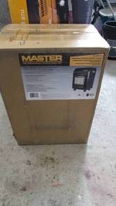 lot 38 image: Master 18,000 BTU LP Portable Cabinet Heater