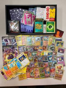 lot 4P image: Assorted Lot Of Pokmon Trading Cards And Other Pokmon Merchandise