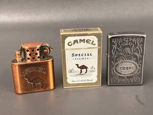 lot 57B image: Vintage Camel and Zippo Lighter Collection Set