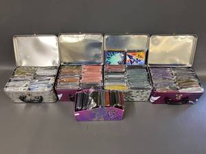 lot 19J image: Pokemon Collector Tin Set with Card Sleeves