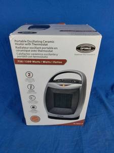 lot 60 image: Optimus Portable Oscillating Ceramic Heater with Thermostat