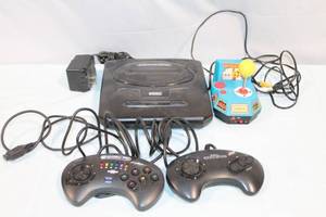 lot A-8 image: Sega Genesis Console with Controllers and Ms. Pac-Man Joystick