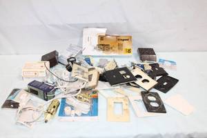 lot 10 image: Assorted Electrical Switch Plates, Outlets, and Lamp Kit Collection