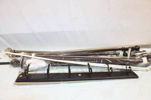 lot 25 image: Set of Mixed Curtain Rods and Wall-Mount Hook Board