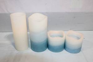 lot 140 image: Set of 4 LED Candle Lights in Blue and White
