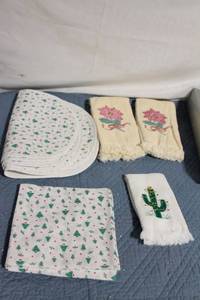 lot 150 image: Set of Holiday Themed Kitchen Linens with Christmas and Cactus Motifs
