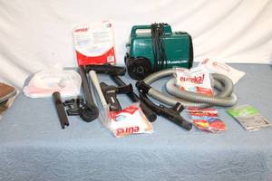 lot 247 image: Eureka Mighty Mite Vacuum Cleaner with Accessories and Bags