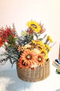 lot 339 image: Decorative Wicker Basket with Artificial Sunflower and Autumn Blooms Arrangement