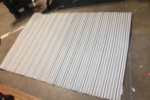 lot 384 image: Gray and White Striped Area Rug 72 x 48