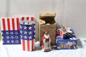 lot 471 image: Patriotic Set Jim Shore Star Spangled Santa, Dip Bowl Spreader, and Flag Themed Bags