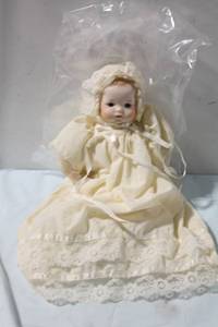 lot 472 image: Vintage Porcelain Baby Doll in Lace Dress