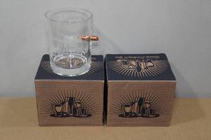 lot 114 image: 2 Lucky Shot Whiskey Glasses with Embedded Bullets