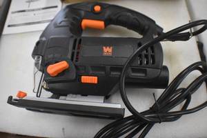 lot 53 image: WEN 33606 6.6-Amp Variable Speed Orbital Jig Saw with Laser and LED Light
