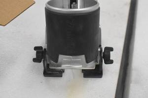 lot 55 image: Makita 198987-9 Compact Router Tilt Base