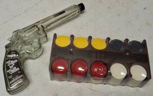 lot 23 image: Tequila Blanco Silver - Hijos de Villa Revolver holds 200ml - Decorative Bottle (Empty) & Poker Chips