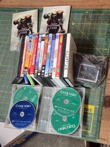 lot 16 image: Assorted DVD Collection and Garmin GPS Device