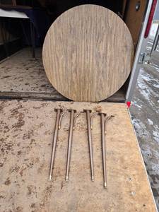 lot 22 image: Round Wooden Table Top with Extension Leaves and Legs