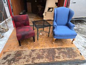 lot 36 image: Wingback Chair, Modern Chair, and Glass Table