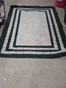 lot 50 image: Large Green and Beige Area Rug with Geometric Pattern 61 x 95