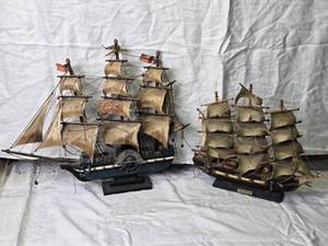 lot 63 image: Pair of Wooden Ship Models with Intricate Sails