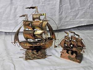 lot 72 image: 2 Vintage Brass Ship Motion Music Boxes