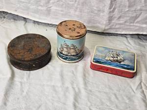 lot 84 image: 3 Vintage Ship Themed Tin Containers