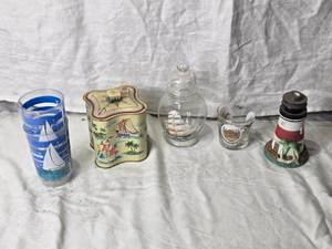 lot 97 image: Nautical Decor with Cups, Tins, and Glass Containers