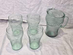 lot 120 image: Coca-Cola Glass Pitcher and 4 Glass Cup Set