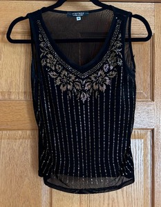 lot 108 image: Size Medium Tank Top by Rampage Clothing Company