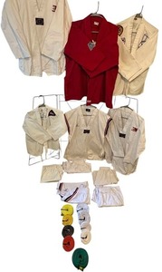 lot 125 image: MARTIAL ARTS TOPBOTTOMSBELTS BUNDLE
