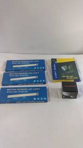 lot 30 image: Set of Motion Sensor LED Lights, Light Panel Book Professional, and LED Headlamp