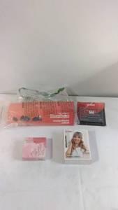 lot 61 image: Mixed Beauty and Personal Care Items - Blender, Razor Refills, Headband, Blush