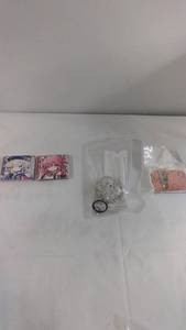 lot 63 image: Collection of Anime Themed Compact Mirror, AirPod Case, and Decorative Soap