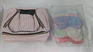 lot 120 image: Pink Striped Travel Bag with Plush Sleep Masks