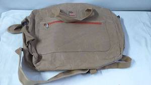 lot 209 image: Pulp Fusion Canvas Backpack in Brown with Orange Accents