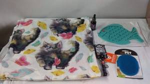 lot 233 image: Cat Lovers Set Cat Blanket, Melatonin Liquid, and Cat Grooming Tools
