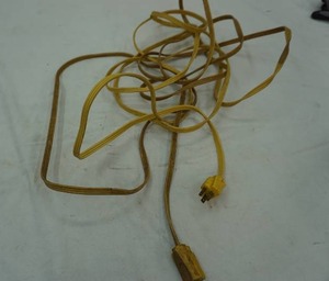 lot 38 image: yellow extension cord, length unknown