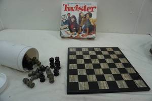 lot 49 image: heavy marble chess set with pieces, and twister