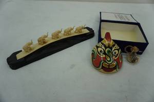 lot 116 image: Oriental Face Mask and elephant figure decor