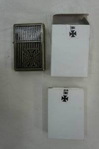 lot 251 image: 2 West Coast Choppers Zippo Lighters