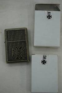 lot 252 image: 2 West Coast Choppers Zippo Lighters