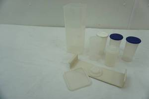 lot 356 image: One Touch salt and pepper shakers with other Tupperware pieces