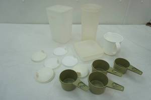 lot 363 image: Tupperware measuring cups, sippy cup tops and containers