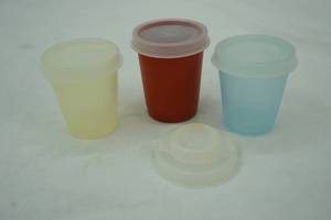 lot 373 image: Tupperware tiny measuring containers