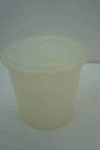 lot 377 image: Tupperware round canister